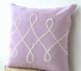 Handmade linen purple pillow with white embroidery