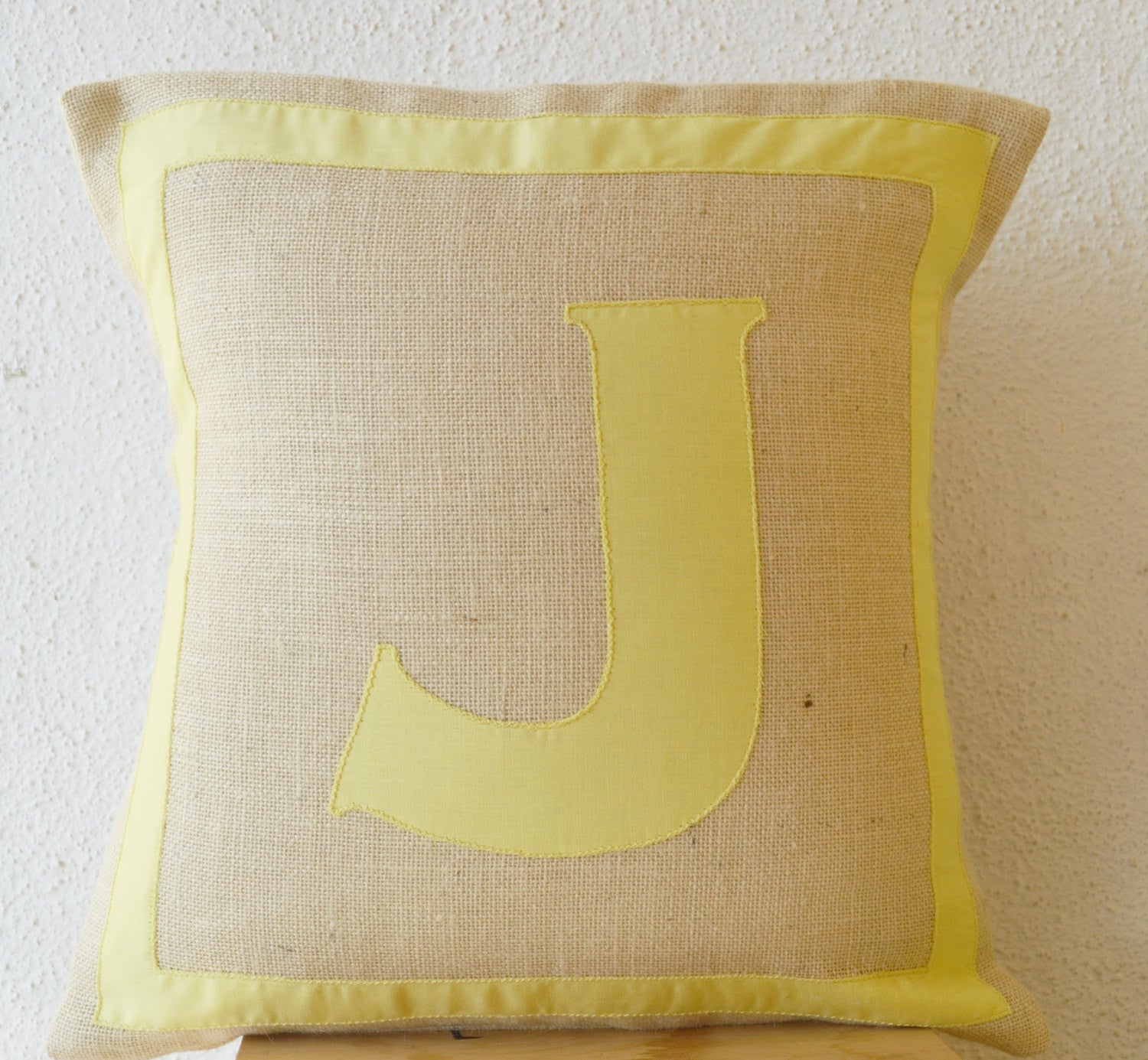 Handmade monogrammed yellow cotton throw pillow