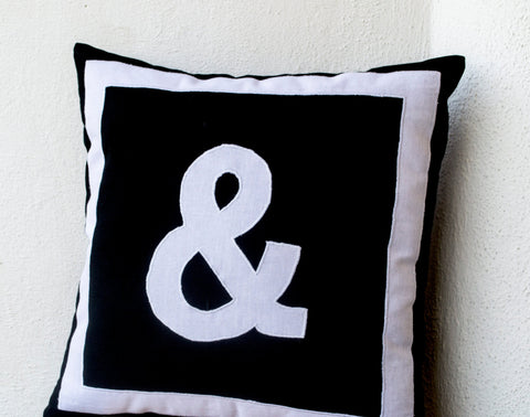 Handmade black cotton pillow with monogram