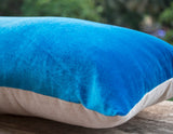 Handmade lush blue velvet throw pillows in oatmeal linen