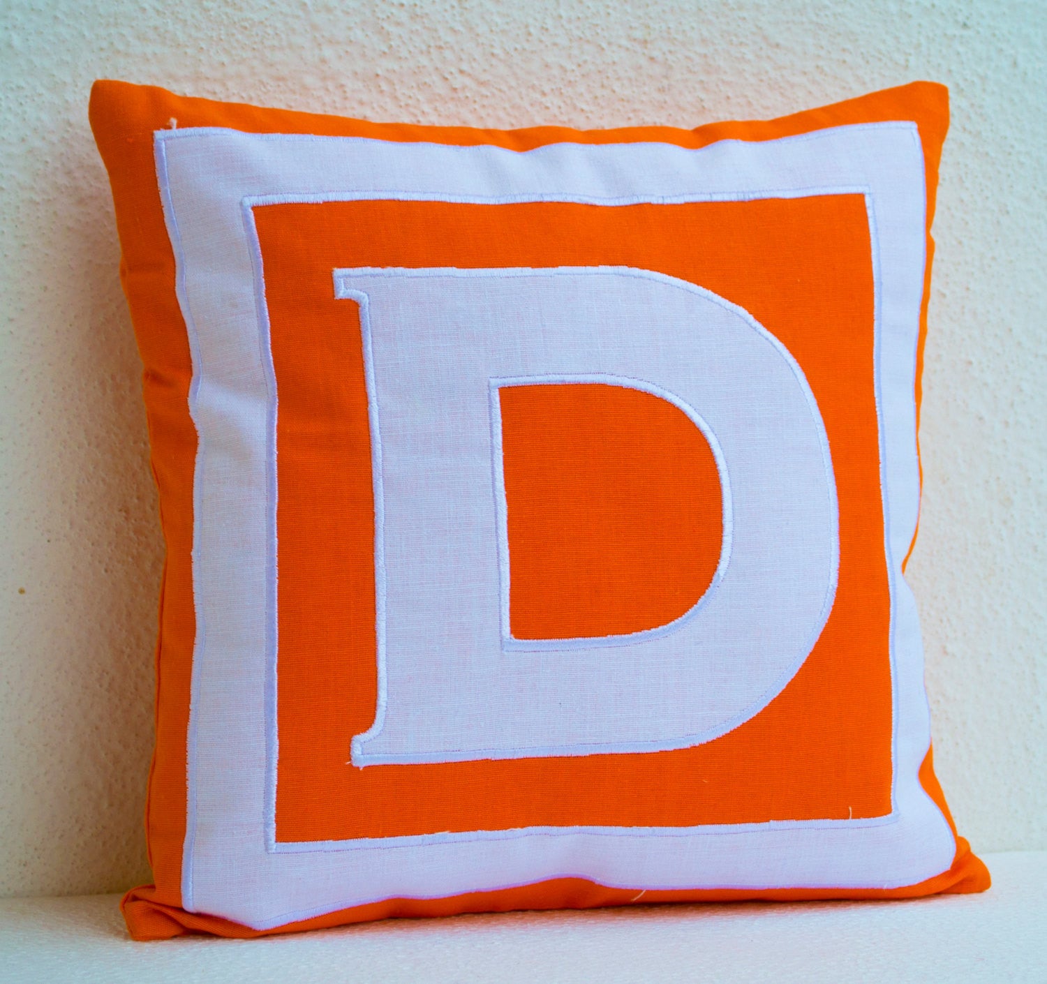Shop for handmade orange and white cushion with alphabet monogram