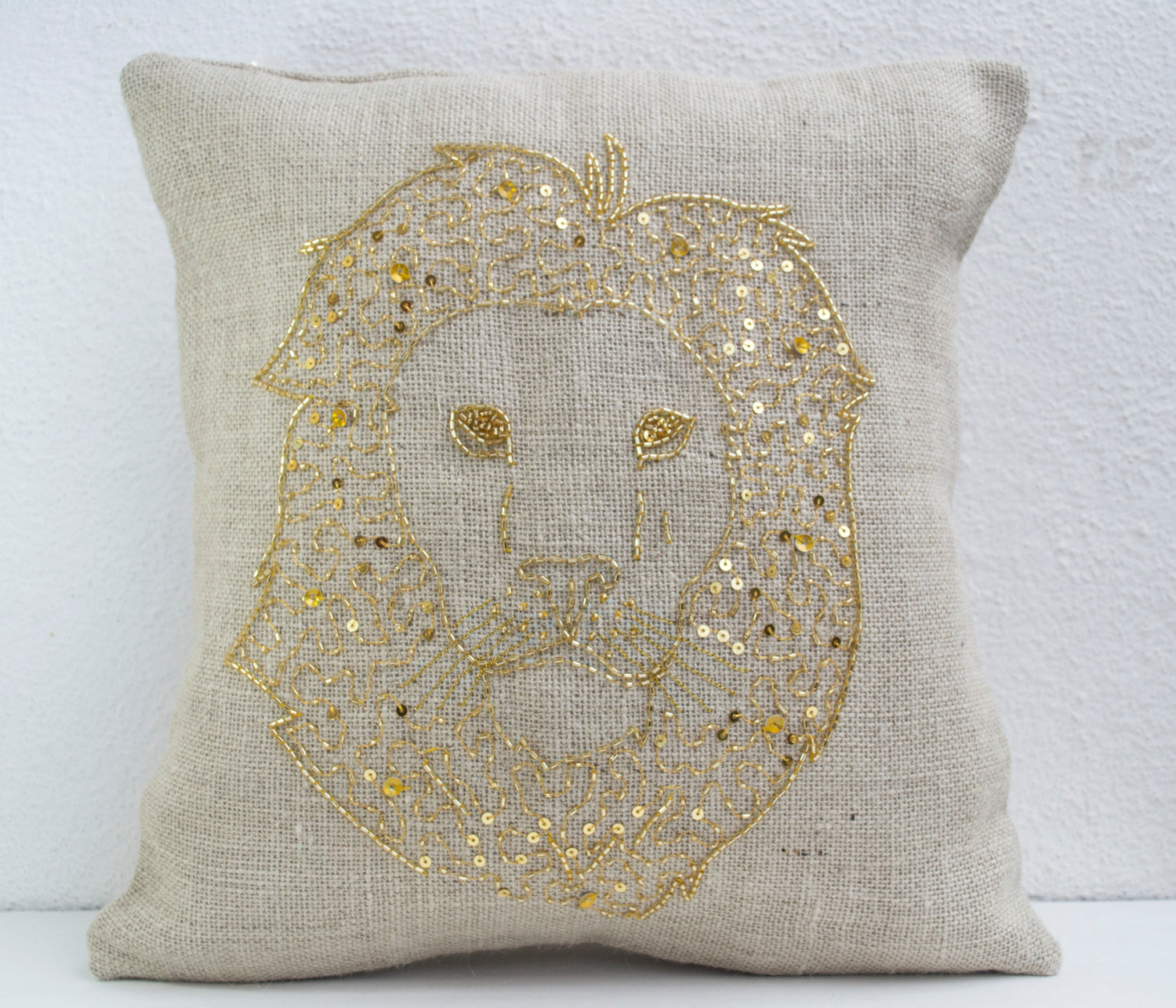 Wildlife pillow with embroidery and gold sequin