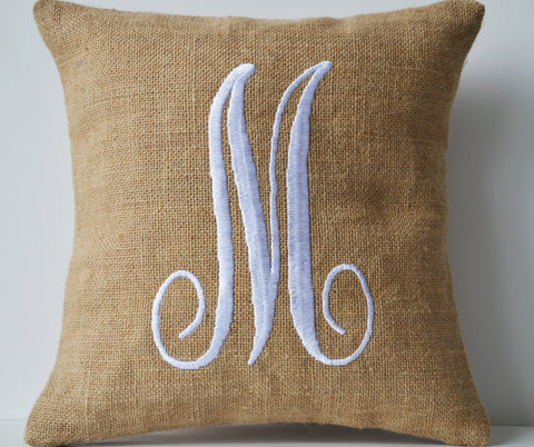 Monogram pillows in natural burlap with white embroidered letter design