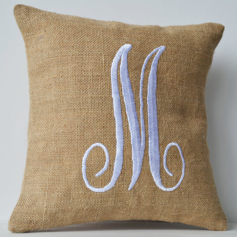 Monogram pillows in natural burlap with white embroidered letter design