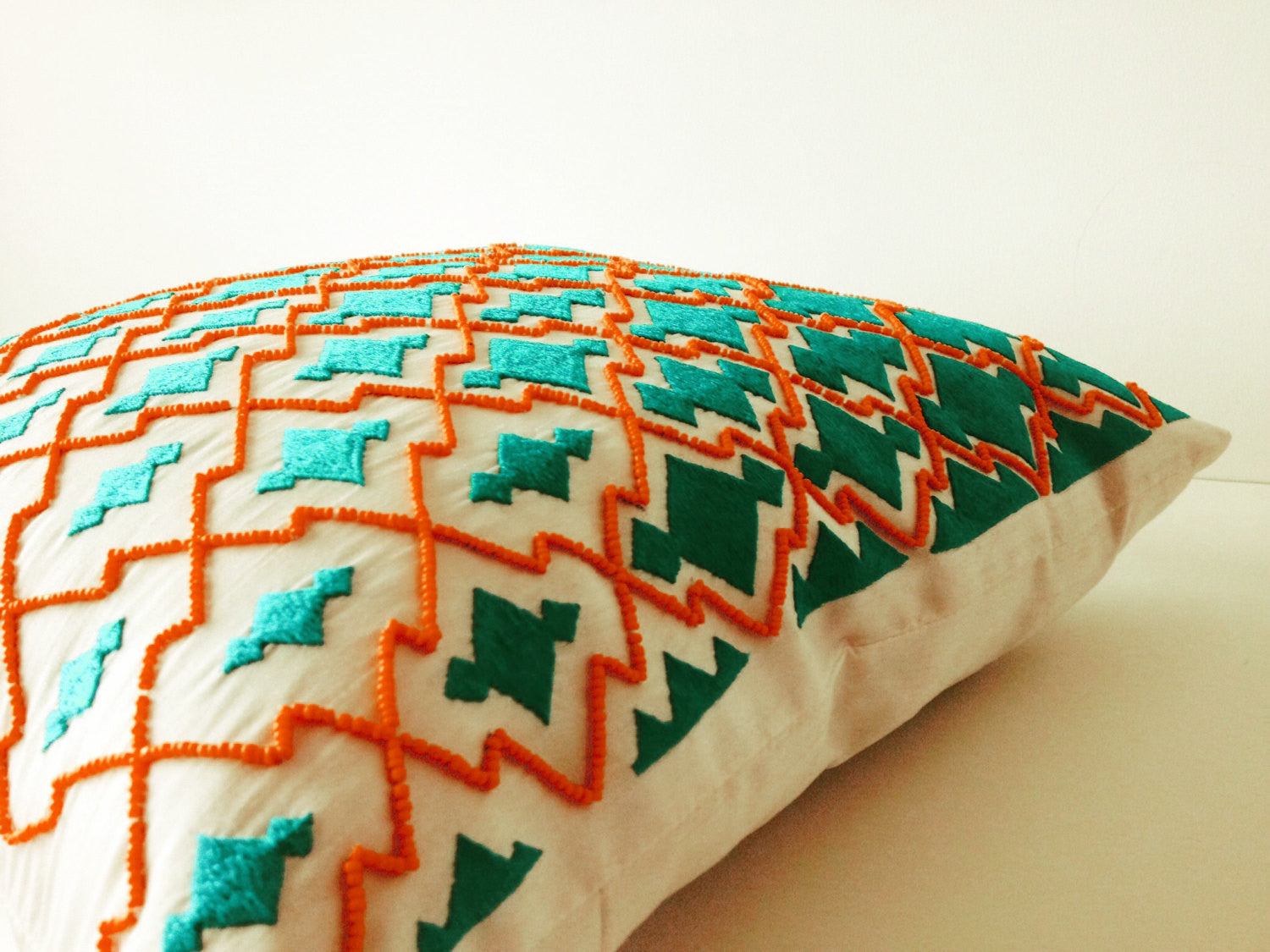 Handmade orange and teal decorative throw pillow cases