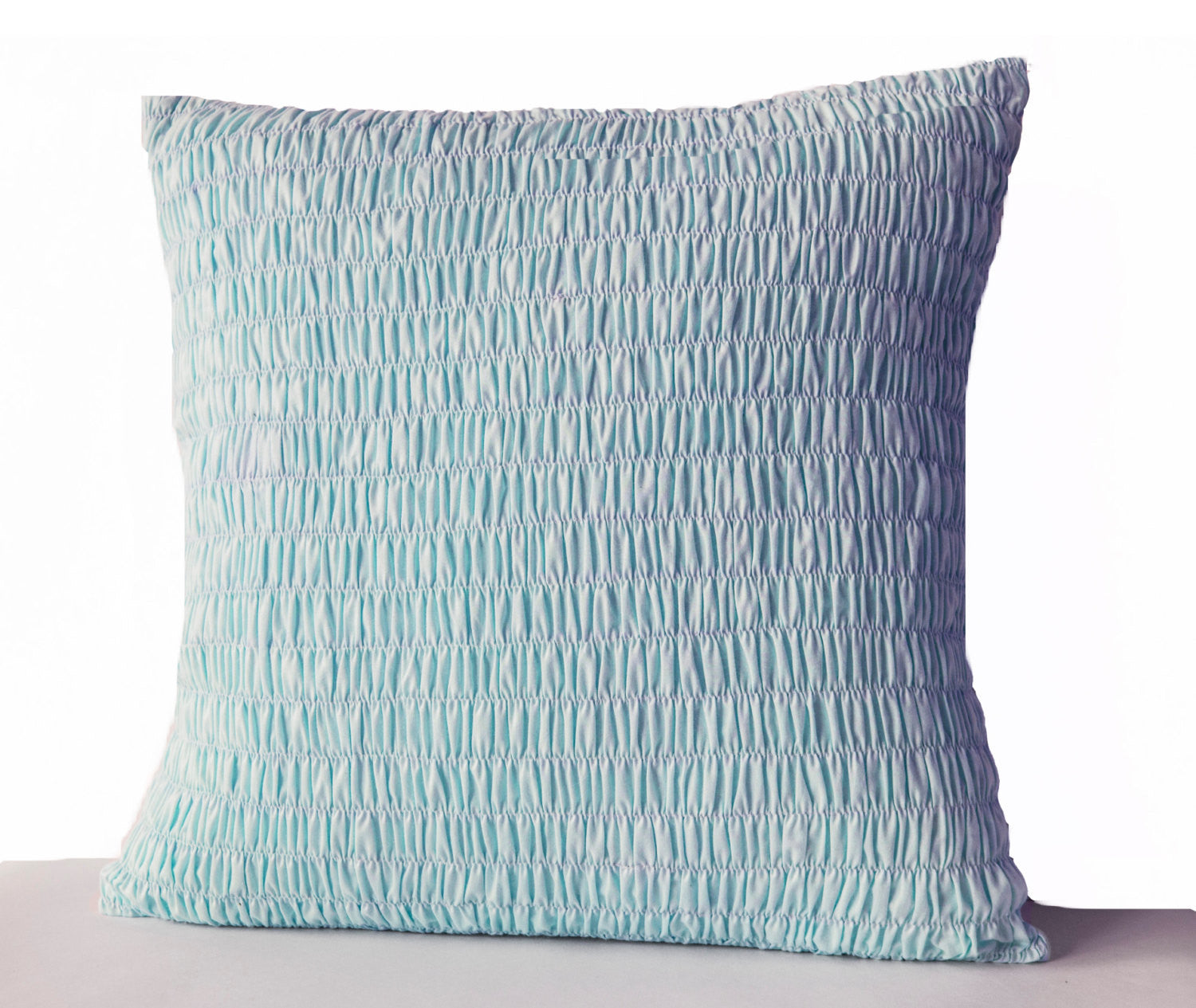 Handmade light blue cotton throw pillow with pleats