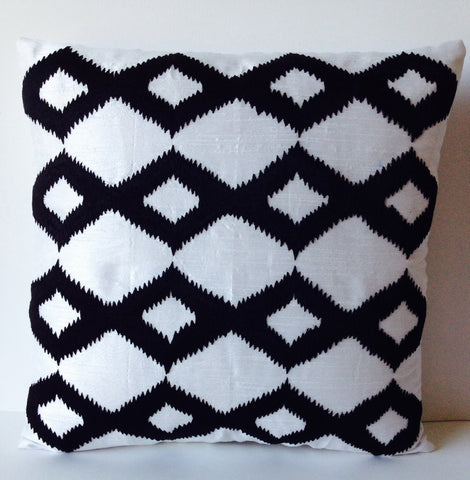 Handmade black and white pillow covers with ikat embroidery