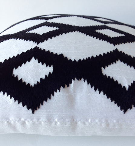 Handmade black and white pillow covers with ikat embroidery