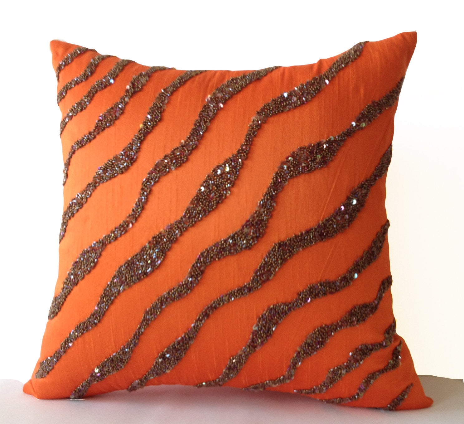 Handmade orange brown throw pillows in silk sequin and beads
