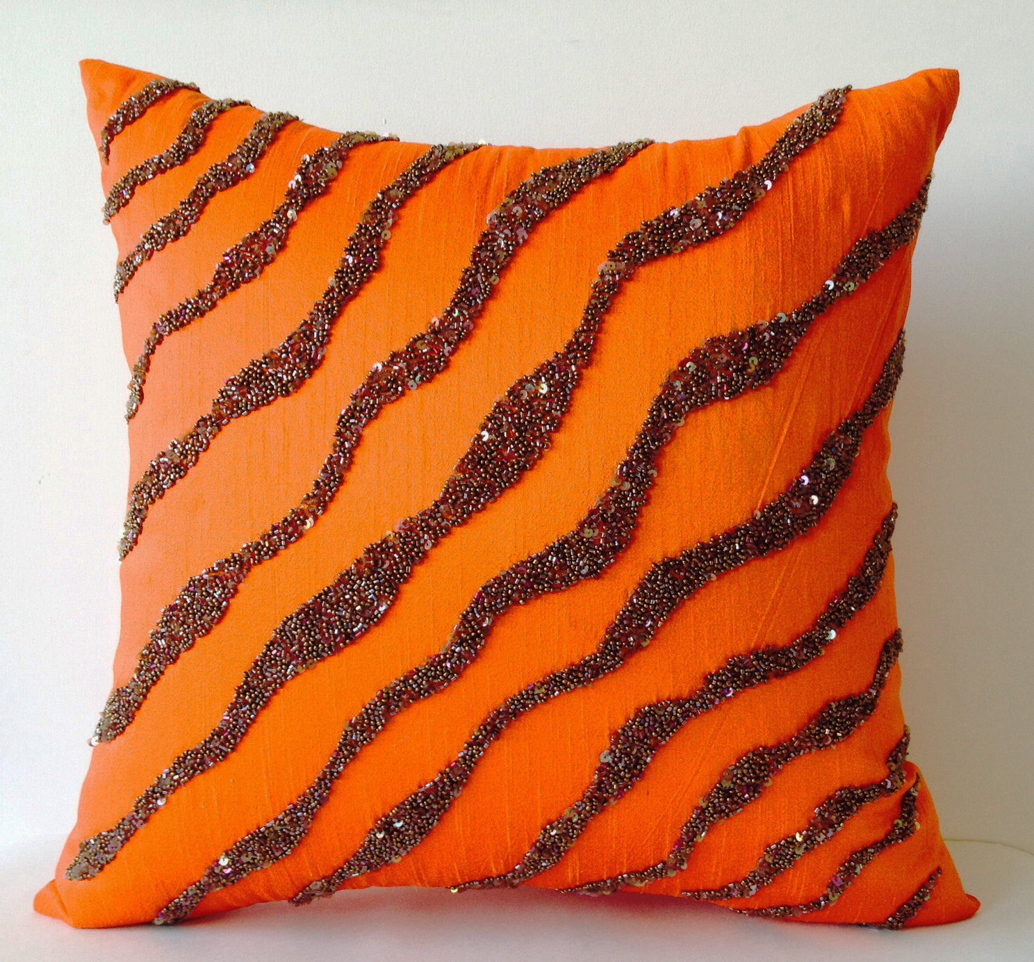 Orange print throw sales pillows