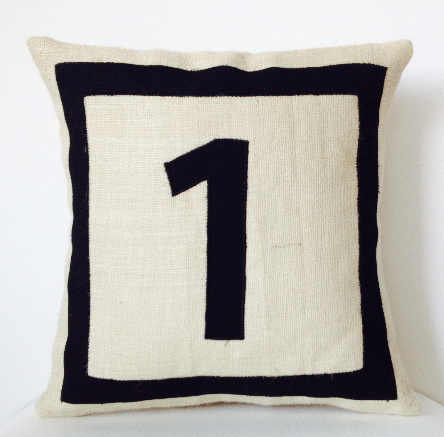Handmade burlap throw pillow and cushion covers with personalized monogram in black