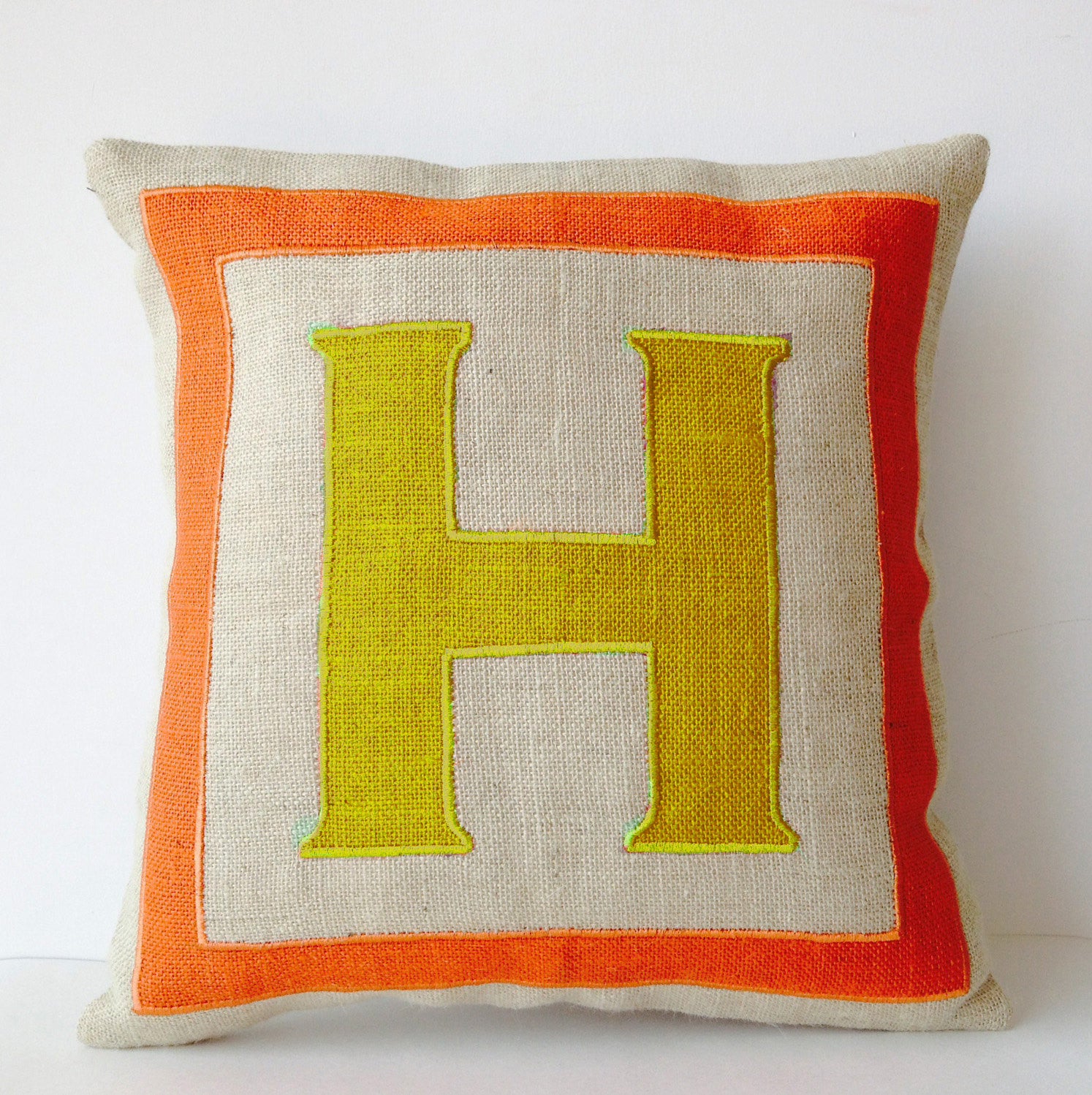 Handmade orange yellow throw pillow with monogram