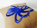 Handmade blue throw pillow with embroidered octopus design