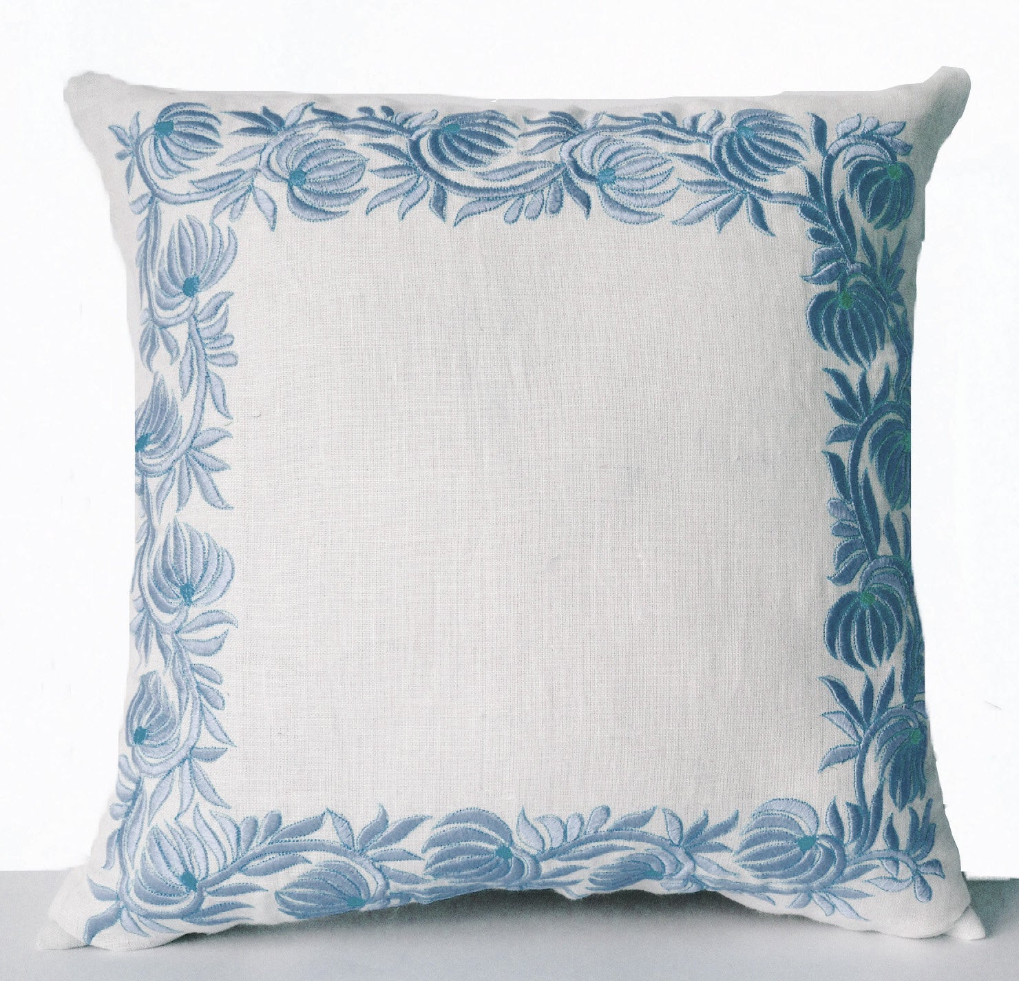 Handmade throw pillow case in white linen and flower embroidery