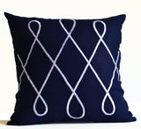 Amore Beaute Blue throw pillow cover with geometric design in white. 