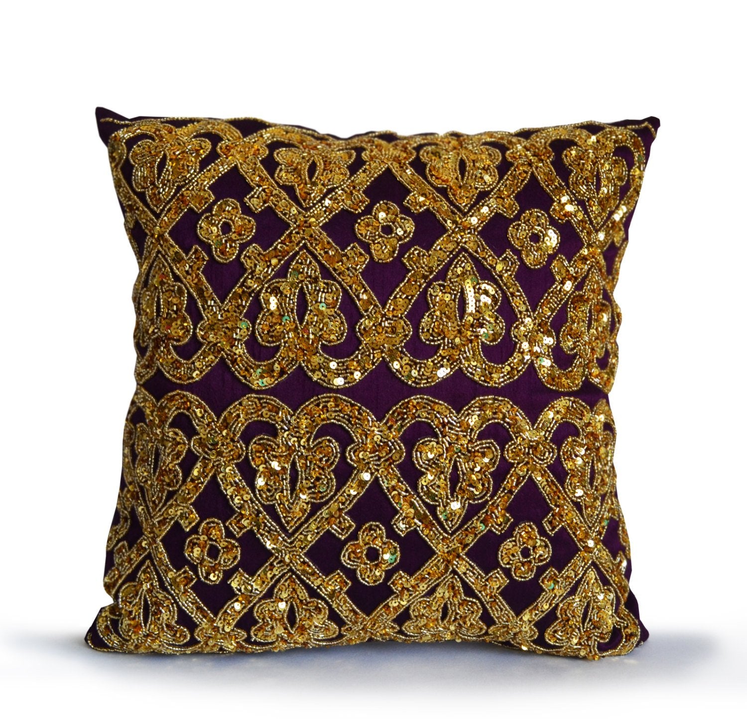 Amore Beaute Purple geometric throw pillows with bead sequins detail.